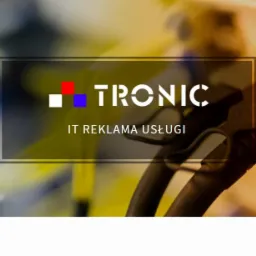 Logo firmy IT TRONIC z hasłem 'IT Reklama Usługi' na tle kabli sieciowych i złączki RJ45.