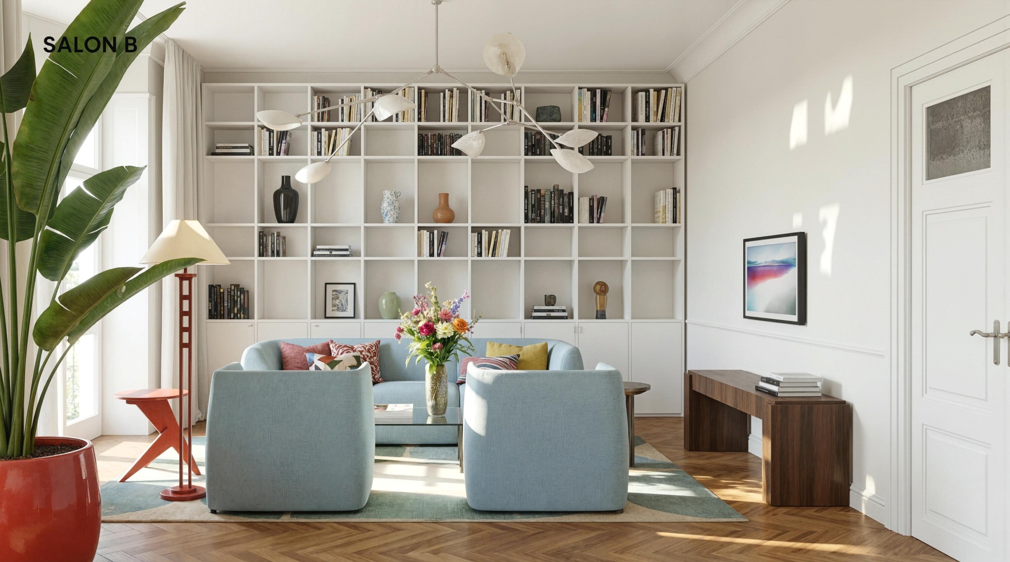 Salon B: Jasne wnętrze z regałem na książki, błękitnymi sofami i parkietem w jodełkę. Roślina w donicy dodaje koloru. Nowoczesny design.