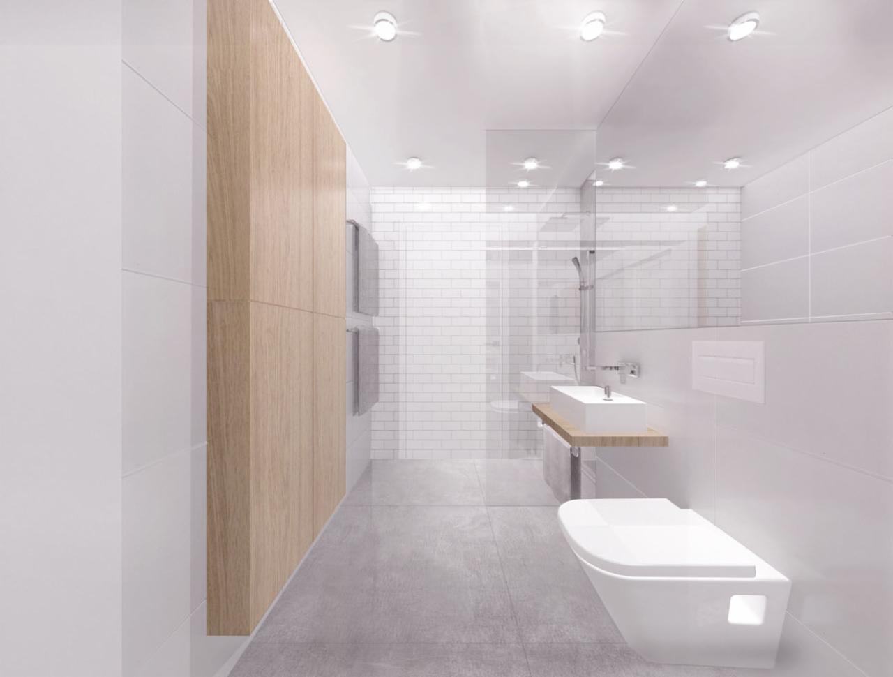 Minimalistyczna łazienka w bieli i drewnie: podwieszana toaleta, prostokątna umywalka na drewnianym blacie, kabina prysznicowa za szklaną ścianką, wysoka szafka z drewnianymi frontami.