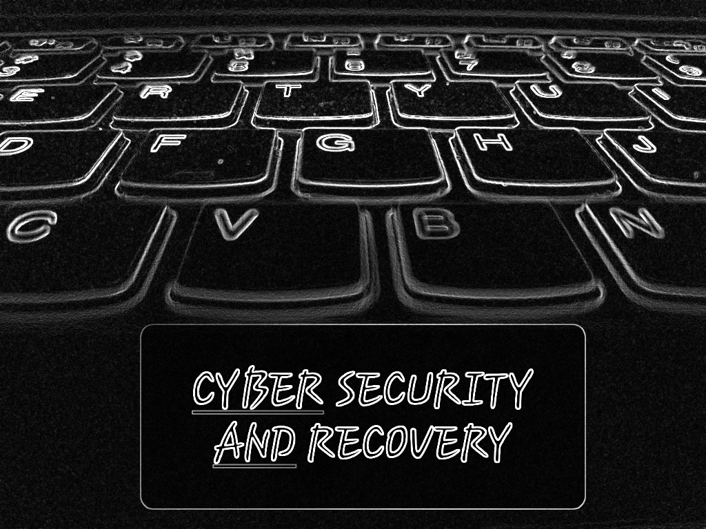 Stylizowana klawiatura laptopa z napisem 'Cyber Security and Recovery' w dolnej części kadru.