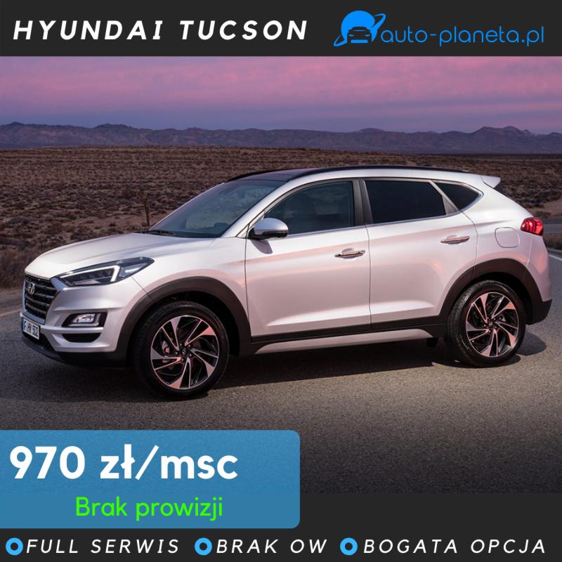 Biały Hyundai Tucson na tle gór o zachodzie słońca, oferta 970 zł/miesiąc, brak prowizji, full serwis, brak OW, bogata opcja, logo auto-planeta.pl w prawym górnym rogu.