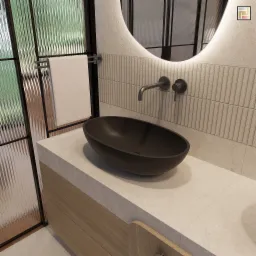 Elegancka łazienka z owalną, czarną umywalką nablatową, baterią w kolorze grafitowym, lustrem z podświetleniem LED i teksturowaną ścianą z płytek w odcieniach beżu. Obok znajduje się kabina...