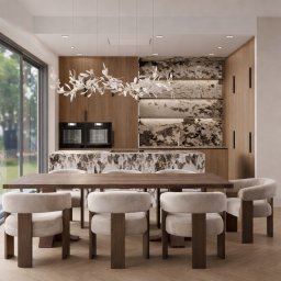 TULLAHOME Sp. z o.o. - Nowoczesna kuchnia z wyspą wykończoną marmurem, drewnianymi szafkami i designerską lampą. Stół z krzesłami w neutralnych barwach. Duże okno z widokiem na zieleń.