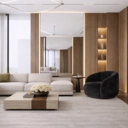 TULLAHOME Sp. z o.o. - Elegancki salon z beżową sofą, drewnianą zabudową z podświetlanymi niszami i dużym lustrem optycznie powiększającym przestrzeń. Minimalistyczny design, parkiet w jodełkę.