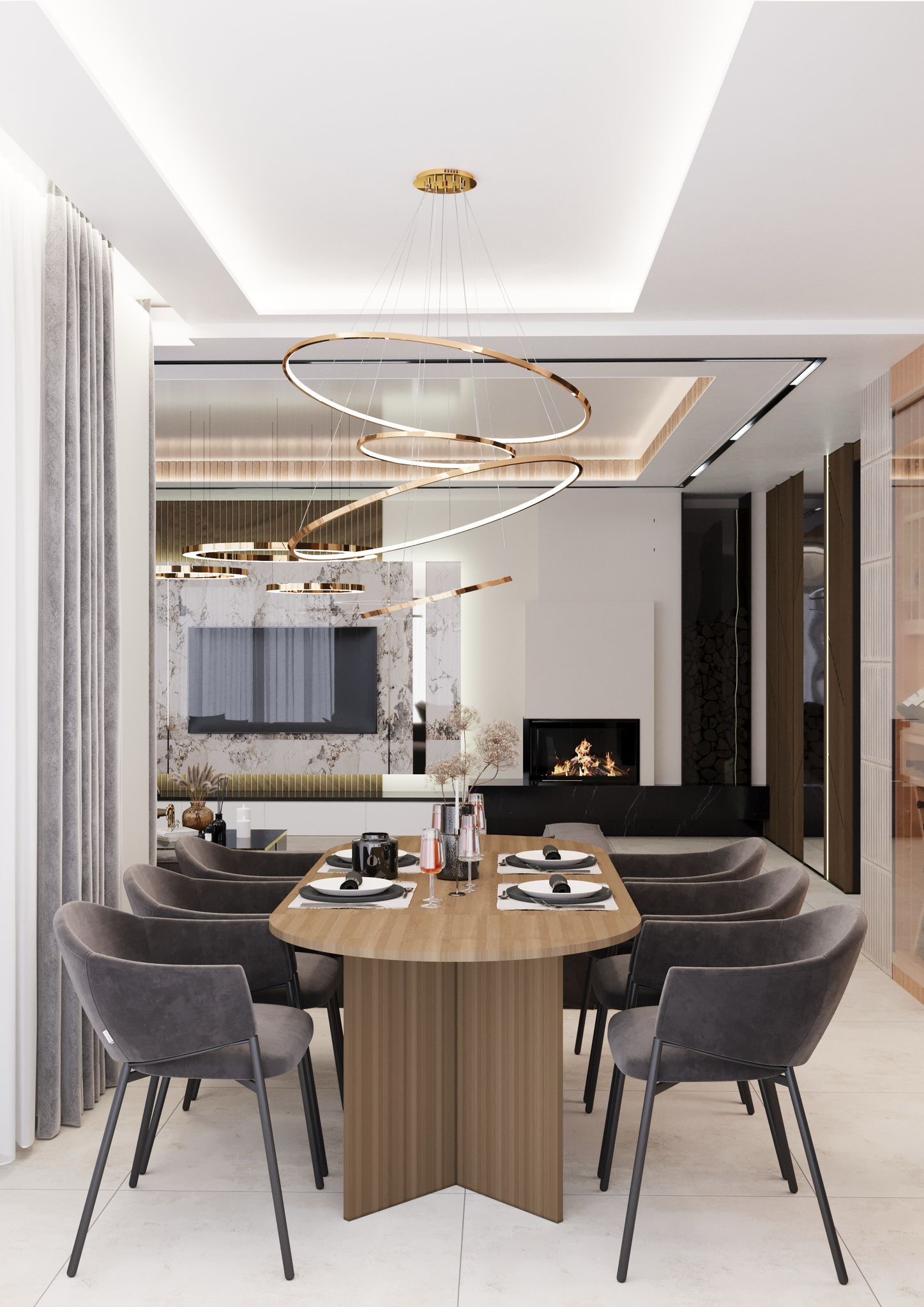 Elegancka jadalnia w nowoczesnym stylu: drewniany stół z szarymi krzesłami, nad nim designerska, okrągła lampa, w tle marmurowa ściana z telewizorem i kominek z paleniskiem.