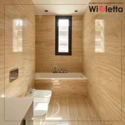 Łazienka w beżowym marmurze – ciepłe barwy kamienia tworzą harmonijne i przytulne wnętrze.