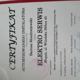 Certyfikat autoryzowanego instalatora LG, przyznany firmie Elektro Serwis za montaż i serwis urządzeń klimatyzacyjnych, z podpisami i datą ważności.