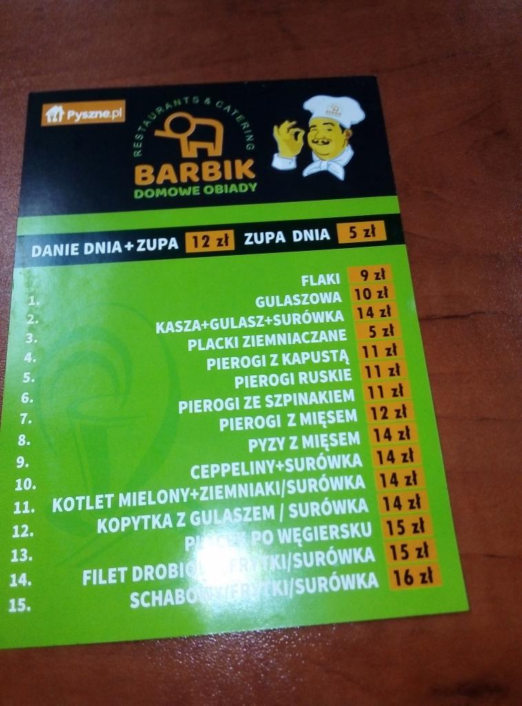 Menu restauracji Barbik z ofertą domowych obiadów, w tym danie dnia z zupą za 12 zł, zupa dnia za 5 zł oraz szeroki wybór dań głównych, takich jak flaki, gulaszowa, pierogi i kotlet mielony, wraz...