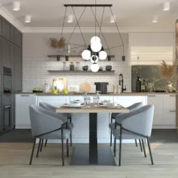 Nowoczesna jadalnia z ceglaną ścianą, szarymi krzesłami i designerską lampą wiszącą na tle wzorzystej ściany w kuchni.