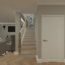 Wizualizacja salonu z drewnianą podłogą w jodełkę, szarą sofą z poduszkami, schodami z motywem kwiatowym na ścianie i czarnym kinkietem przy białych drzwiach.