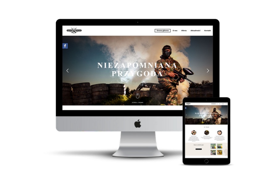 Monitor i tablet prezentują responsywną stronę internetową z motywem paintballowym: gracz w masce i kombinezonie trzyma marker na tle opon i dymu.