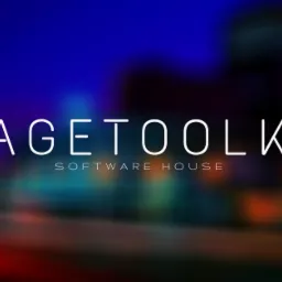 Rozmyte logo 'MAGETOOLKIT SOFTWARE HOUSE' na tle abstrakcyjnych, kolorowych świateł w odcieniach niebieskiego, zielonego i czerwonego.