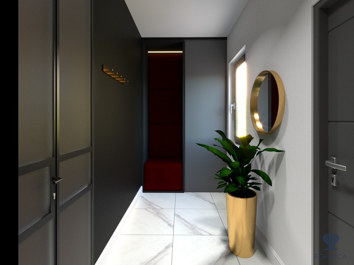 Nowoczesny przedpokój z ciemnymi ścianami, marmurową podłogą, złotym lustrem i rośliną w złotej donicy, widoczne wieszaki na ścianie i czerwone siedzisko w głębi.