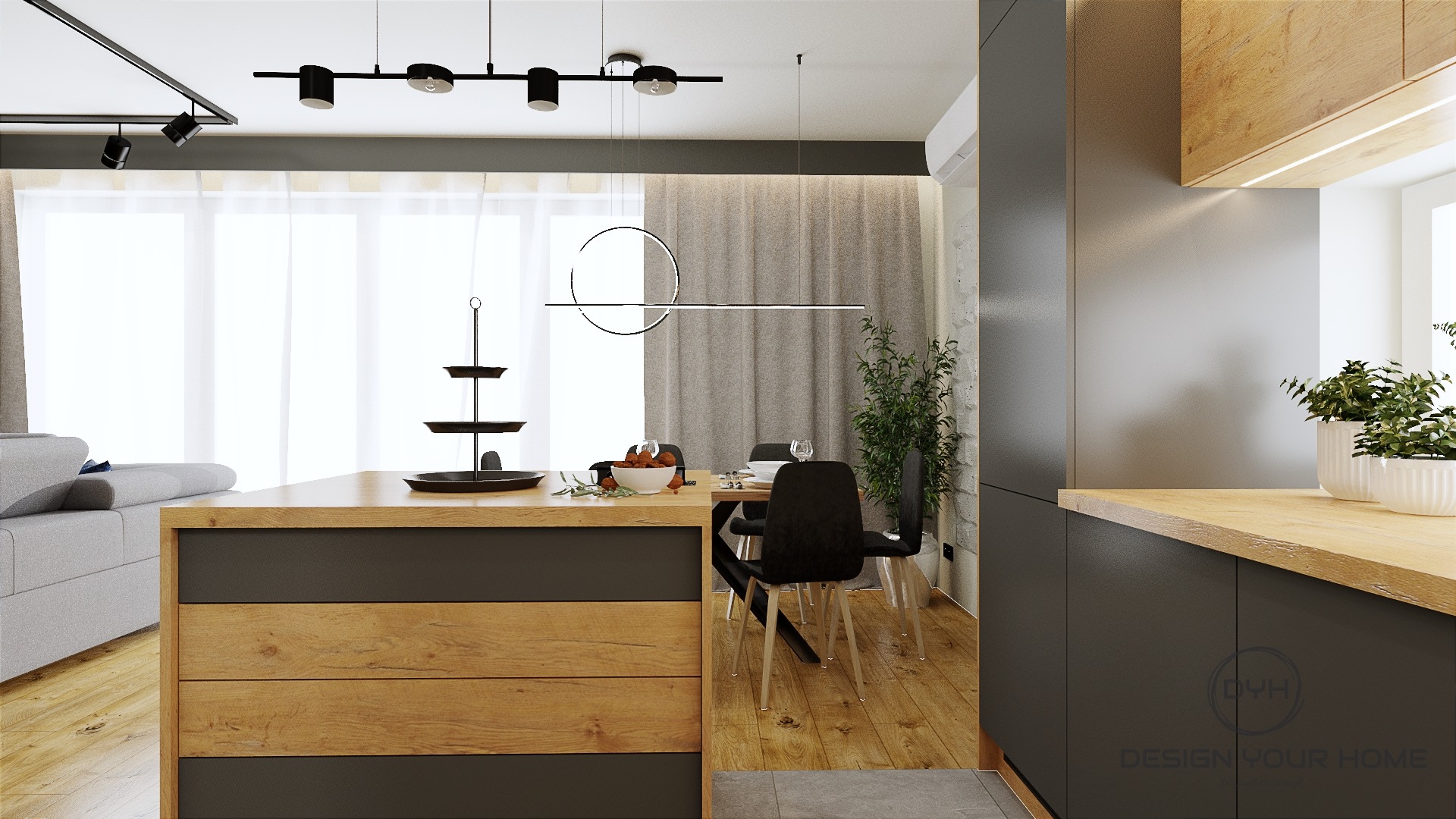 Wnętrze nowoczesnego mieszkania z drewnianą wyspą kuchenną, czarnymi krzesłami i geometryczną lampą wiszącą, widok na jadalnię i salon z szarą sofą.
