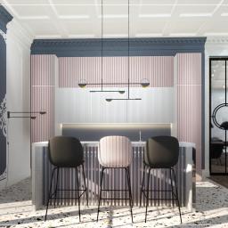 Wako Design - Kuchenna wyspa w stylu Art Deco z trzema hokerami na tle różowo-białej ściany z pionowymi paskami i modernistyczną lampą wiszącą, widok na salon przez przeszklone drzwi.