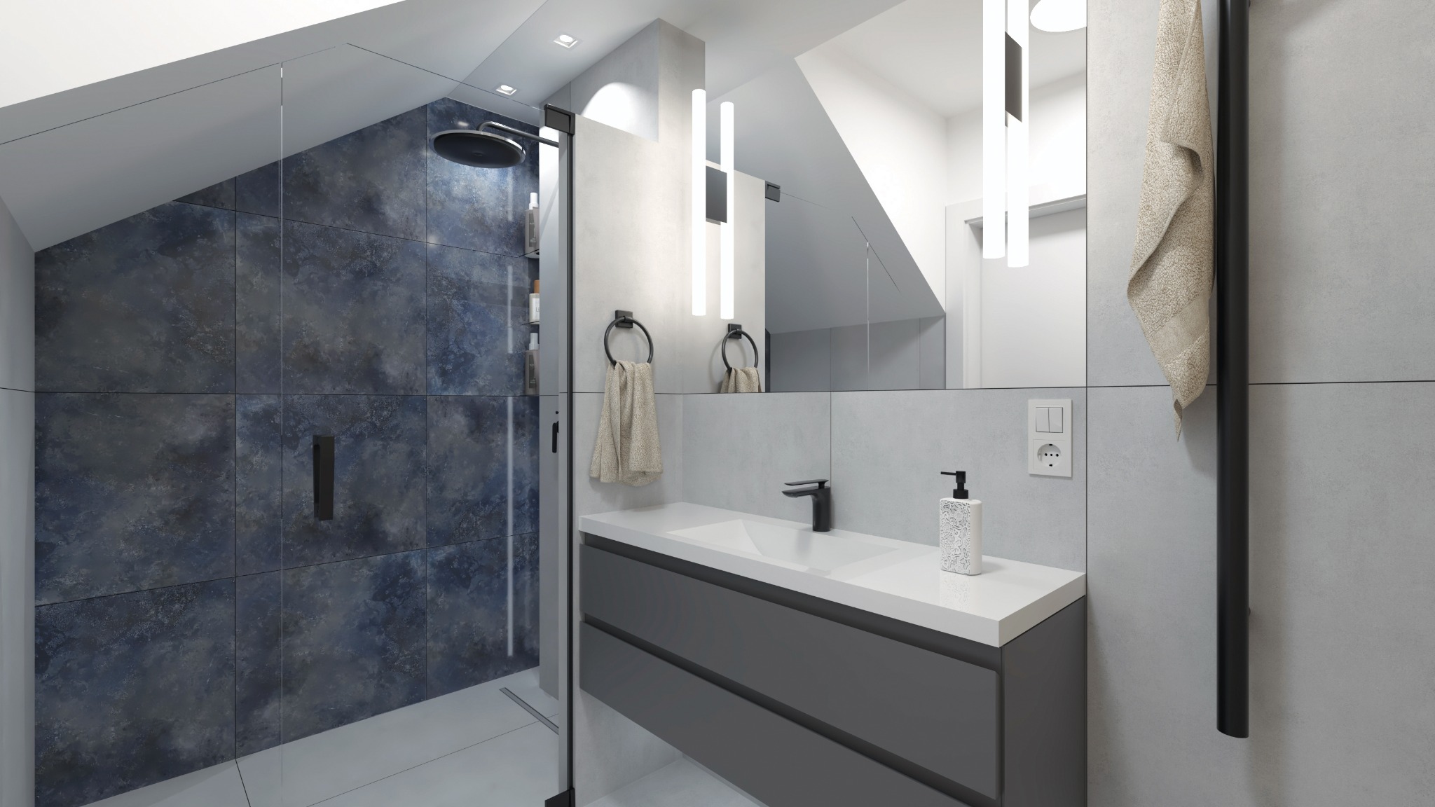 Nowoczesna łazienka na poddaszu z kabiną prysznicową wykończoną płytkami imitującymi kamień, szarą szafką pod umywalką, podświetlanym lustrem i czarną armaturą.