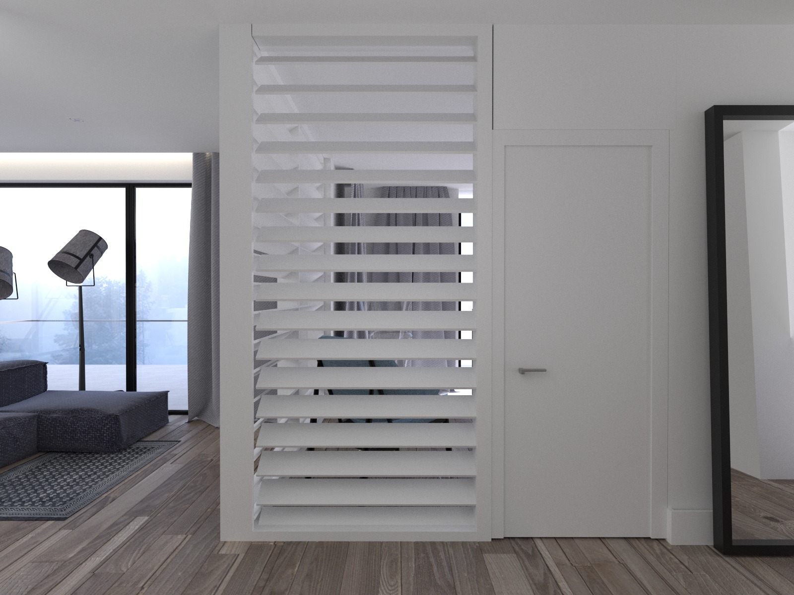 Minimalistyczne wnętrze z drewnianą podłogą, szarą sofą, lampami studyjnymi i białą ścianką działową z żaluzjami, obok drzwi i ramy lustra.