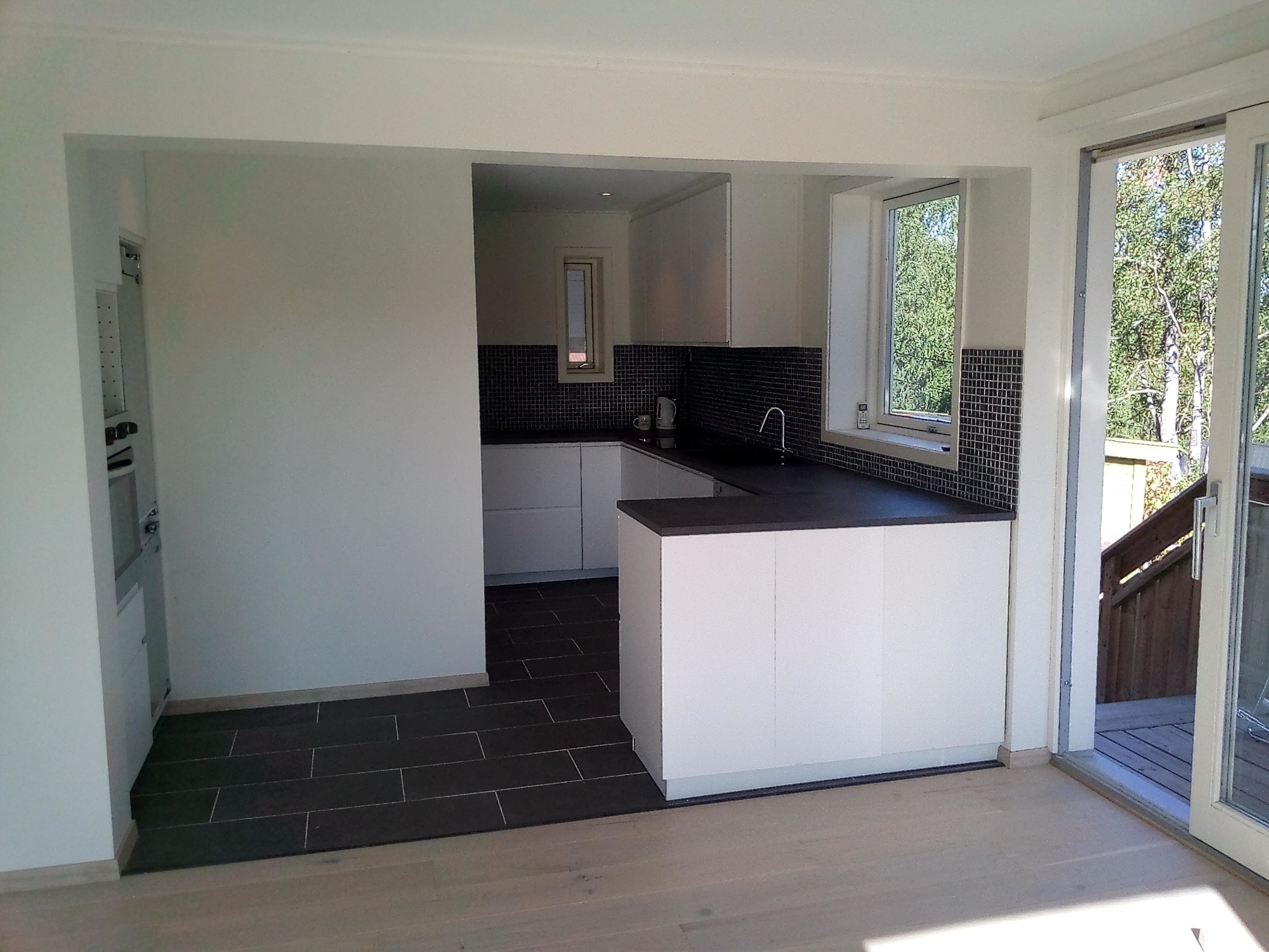 Kuchnia w domu jednorodzinnym w Oslo.