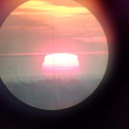 Wschód słońca w obiektywie - widok z 8 piętra budynku