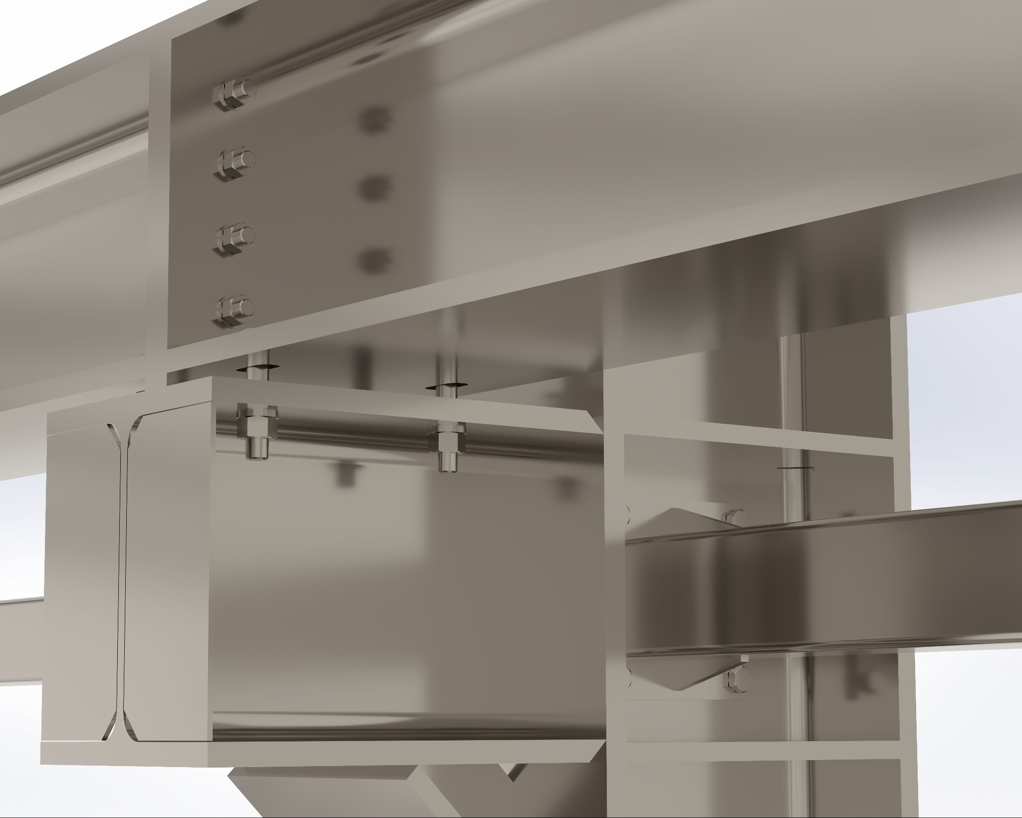 Szczegółowe ujęcie połączenia belek stalowych za pomocą śrub i blach węzłowych, ukazujące precyzję wykonania i solidność konstrukcji.