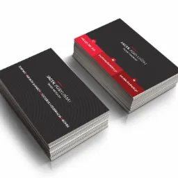 Dwie sterty wizytówek trenera mentalnego Jacka Kobylińskiego, utrzymane w czarno-czerwonej kolorystyce z danymi kontaktowymi i hasłami: zdrowie, rozwój osobisty, szczęście, celebracja, biznes.