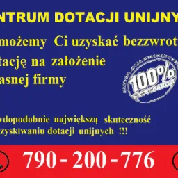 Grafika reklamowa z tekstem 'Centrum Dotacji Unijnych' i numerem telefonu na granatowo-czerwonym tle, z okrągłym logo '100% Satysfakcji'.