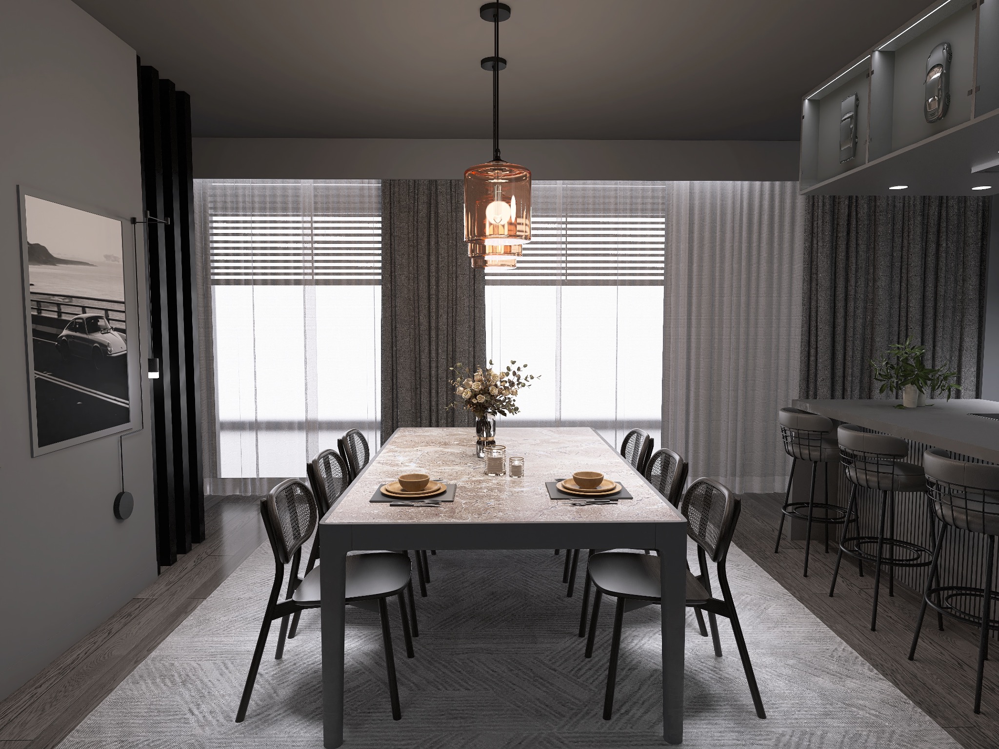 Nowoczesna jadalnia w stonowanych szarościach z długim stołem, nakryciami dla dwóch osób, ozdobnym bukietem i wiszącą lampą z pomarańczowego szkła, uzupełniona o bar z hokerami i dekoracyjne modele...