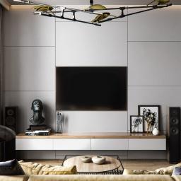 KGM Design Group - Eleganckie wnętrze salonu z szarą ścianą z paneli, podwieszanym telewizorem, białym barkiem z drewnianym blatem, rzeźbą głowy, głośnikami, abstrakcyjnymi grafikami w czarnych ramkach, nowoczesną...