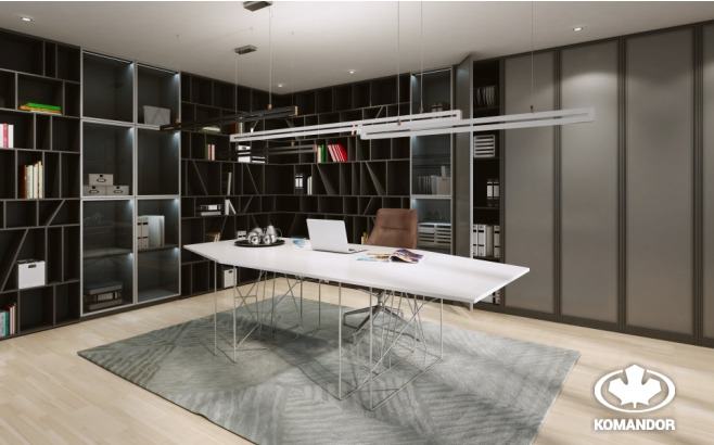 Nowoczesne biuro z zabudową regałową w kolorze ciemnego grafitu, podświetlane półki, duży biały stół na geometrycznych nogach, szara wykładzina dywanowa i przesuwne drzwi z matowego szkła.