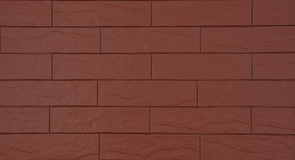 Czerwona płytka elewacyjna CERRAD o fakturze łupka, ułożona w regularny wzór na ścianie.