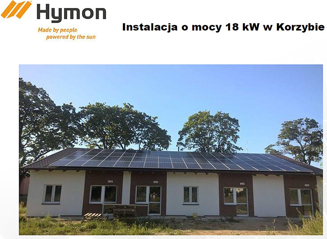Dom jednorodzinny z panelami słonecznymi na dachu, instalacja o mocy 18 kW w Korzybiu, logo Hymon w lewym górnym rogu.