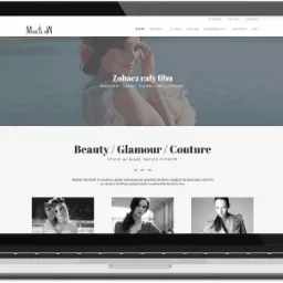 Ekran laptopa wyświetla stronę internetową MarylaW (marylaw.pl) z fotografią modelki w sukni ślubnej na tle jeziora, nagłówkiem 'Beauty/Glamour/Couture' i trzema miniaturami zdjęć.