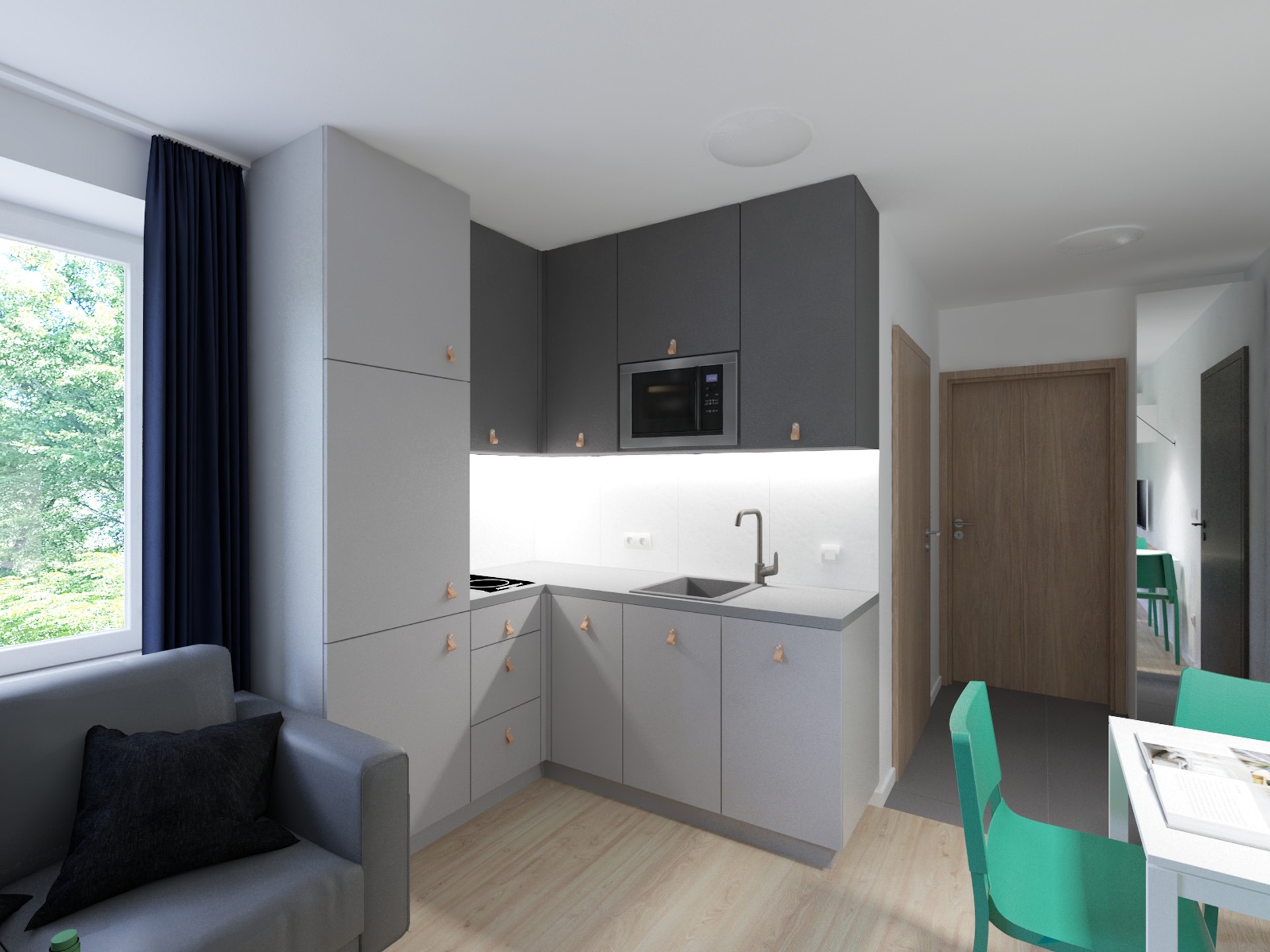 Wizualizacja wnętrza małej kuchni w szarościach z drewnianymi akcentami, widok na okno z ciemną zasłoną i część salonu z szarą sofą oraz jadalnię z zielonymi krzesłami.