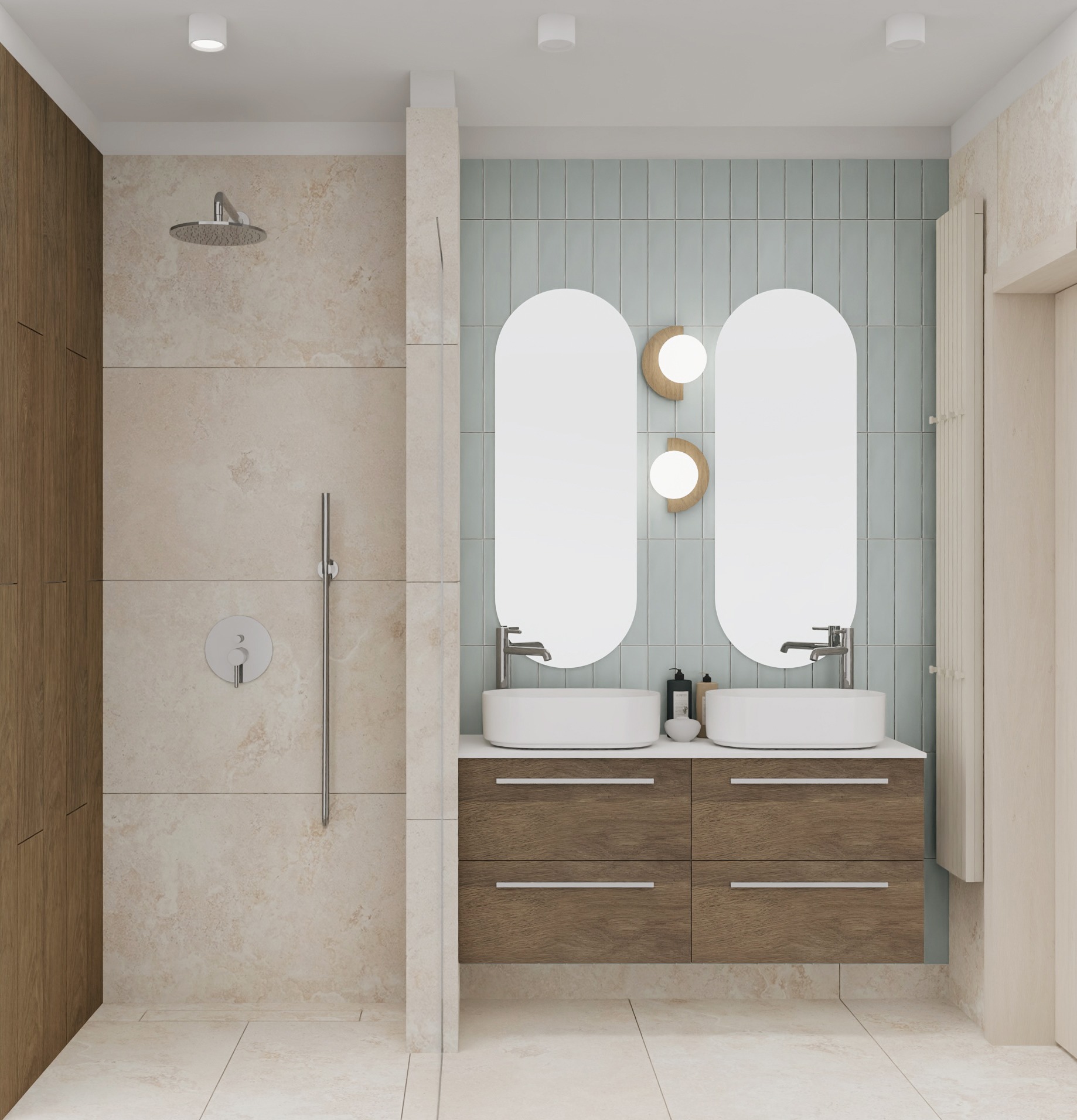 Nowoczesna łazienka z kabiną prysznicową typu walk-in, podwójną umywalką nablatową na drewnianej szafce z szufladami i dwoma owalnymi lustrami podświetlonymi dekoracyjnymi lampami ściennymi.