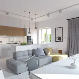 Jasne, nowoczesne wnętrze: kuchnia z wyspą przechodząca w salon z szarą sofą modułową, oświetlenie szynowe i minimalistyczne lampy wiszące.