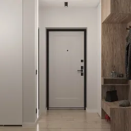 Nowoczesny przedpokój z białą szafą wnękową z oświetleniem LED, drewnianym panelem z wieszakami na ubrania, siedziskiem z półkami i czarną torebką.