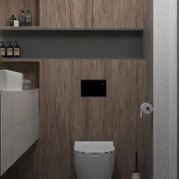 Nowoczesna łazienka z podwieszaną miską WC, szafkami z drewnopodobnym fornirem, szarą zabudową i minimalistycznym dozownikiem mydła na półce.