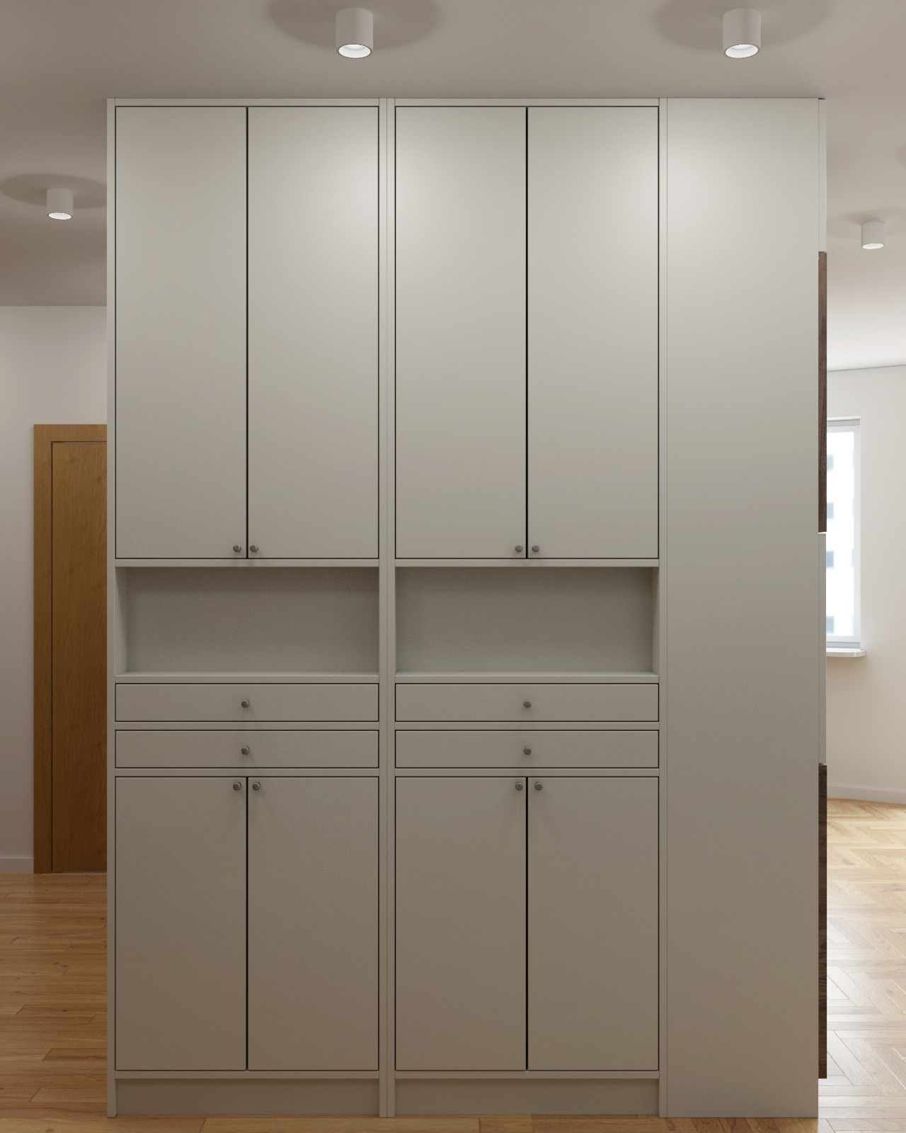 Zabudowa meblowa z szafkami i szufladami w przedpokoju mieszkania w Krakowie, utrzymana w stonowanej kolorystyce, z minimalistycznymi uchwytami.