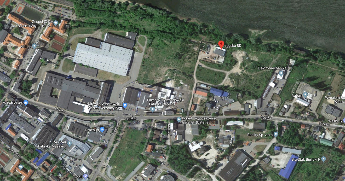 Zdjęcie satelitarne Włocławka z widocznymi budynkami przemysłowymi, fabrykami i drogami, z zaznaczoną lokalizacją firmy przy ulicy Łęgskiej.
