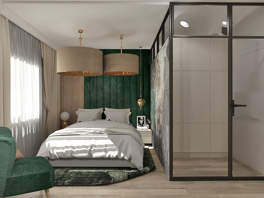 Nowoczesna sypialnia z zielonym panelem ściennym, dwoma okrągłymi lampami wiszącymi, szklaną ścianą działową i zielonym fotelem.