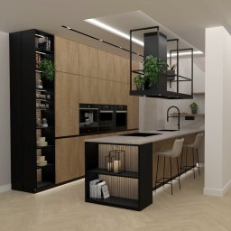 Faber.studio Martyna Radziszewska - Nowoczesna kuchnia z drewnianymi frontami, czarnymi akcentami i wyspą. Minimalistyczny design z roślinami doniczkowymi i oświetleniem LED.