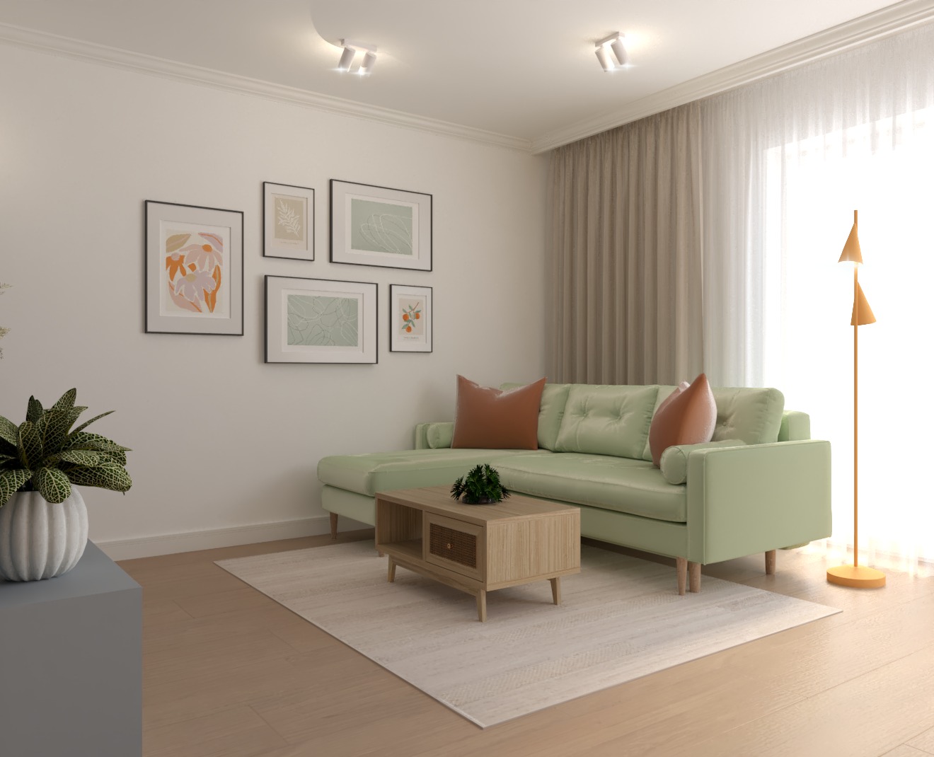 Jasnozielona sofa narożna z brązowymi poduszkami w salonie z drewnianą podłogą, dywanem w kolorze ecru, stolikiem kawowym z rattanową wstawką i galerią obrazków na ścianie.