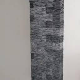 Dekoracyjny panel z szarego kamienia ułożony na ścianie, widok na narożnik pomieszczenia z podłogą z paneli.