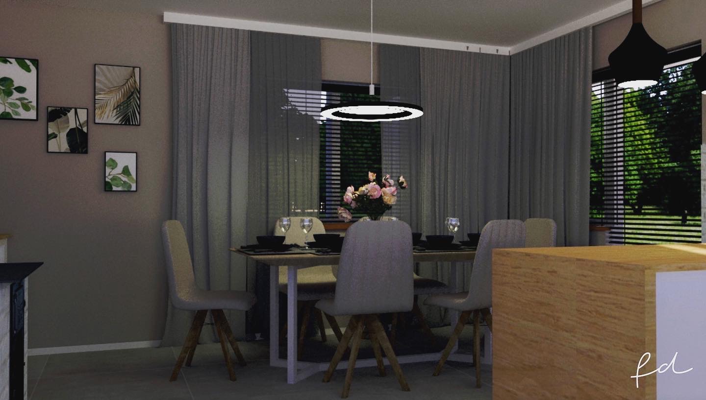 Jadalnia w stonowanych barwach z drewnianym stołem, krzesłami tapicerowanymi szarą tkaniną, okrągłą lampą wiszącą i dekoracjami roślinnymi na ścianie.