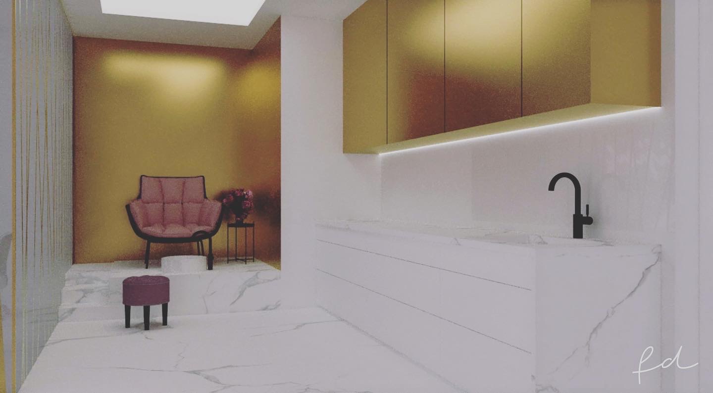 Wizualizacja łazienki z złotymi szafkami, marmurowym blatem, czarną armaturą i różowym fotelem w tle.