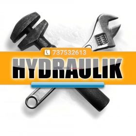 Dwa skrzyżowane klucze nastawne na białym tle z pomarańczowym paskiem i napisem 'HYDRAULIK' oraz numerem telefonu.