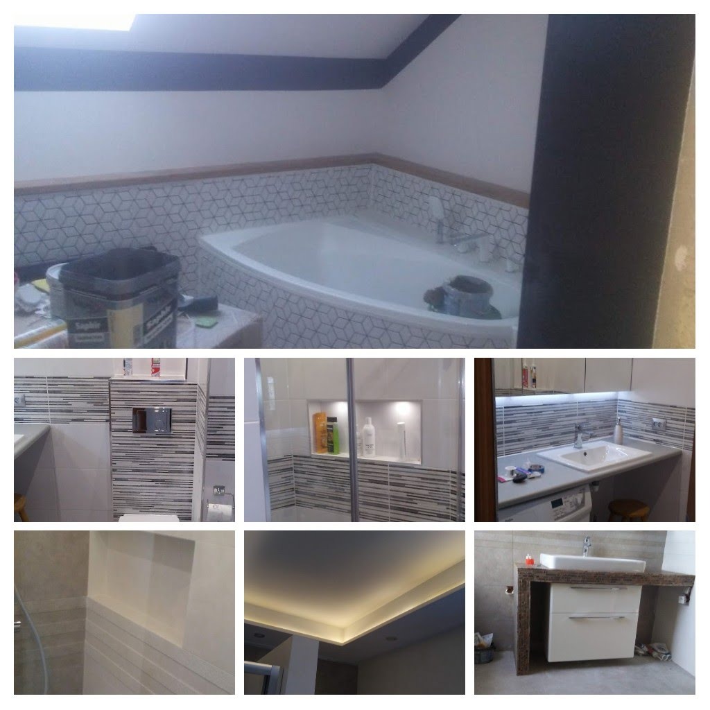 Wnętrze łazienki w trakcie prac wykończeniowych: widoczna wanna obudowana mozaiką, fragment toalety z zabudowanym stelażem, wnęka z oświetleniem, umywalka z szafką i pralką, oraz sufit...