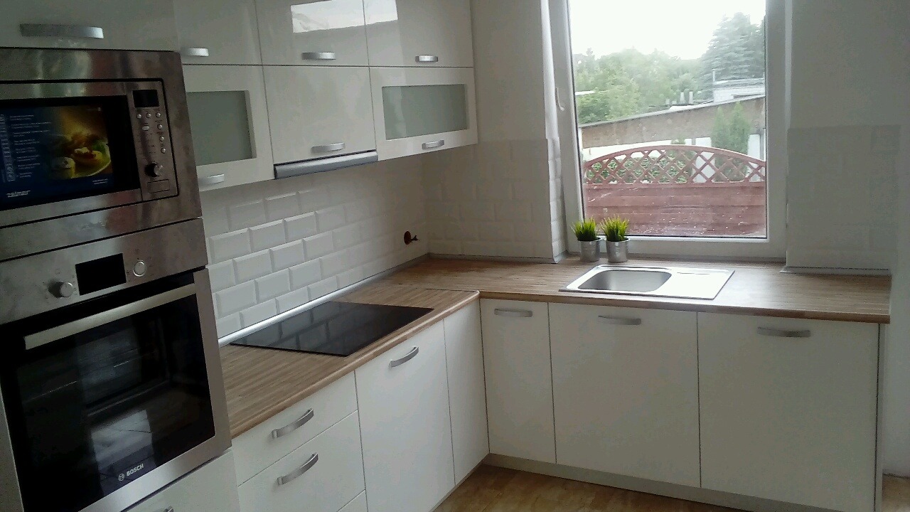 Wykonanie kuchni od podstaw, wraz z meblami własnej produkcji.