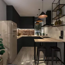 Nowoczesna kuchnia w odcieniach czerni i beżu z ceglaną ścianą nad blatem, oświetlona wiszącymi lampami w kształcie stożków i wyposażona w beżową lodówkę SMEG.