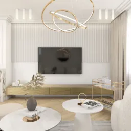 Nowoczesny salon z kominkiem obłożonym marmurem, telewizorem na ścianie z lamelami, okrągłymi stolikami kawowymi i designerską lampą wiszącą z elementami w kolorze złota.